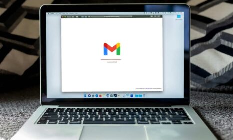 macbook pro on black textile