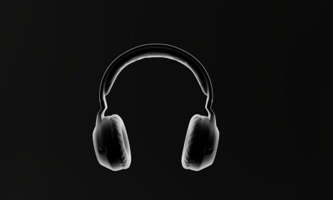 a pair of headphones on a black background
