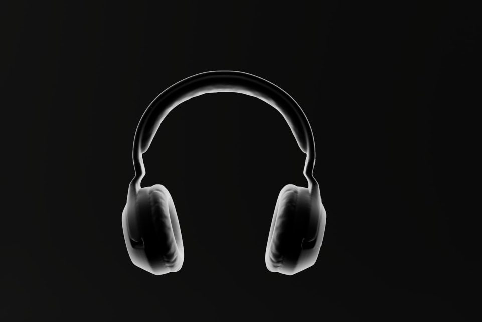 a pair of headphones on a black background