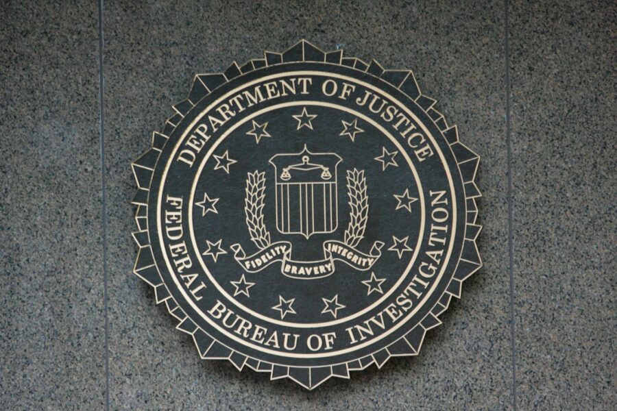the seal of the department of justice on a wall