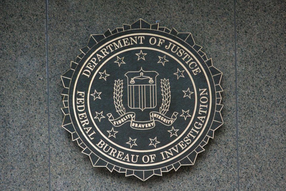the seal of the department of justice on a wall