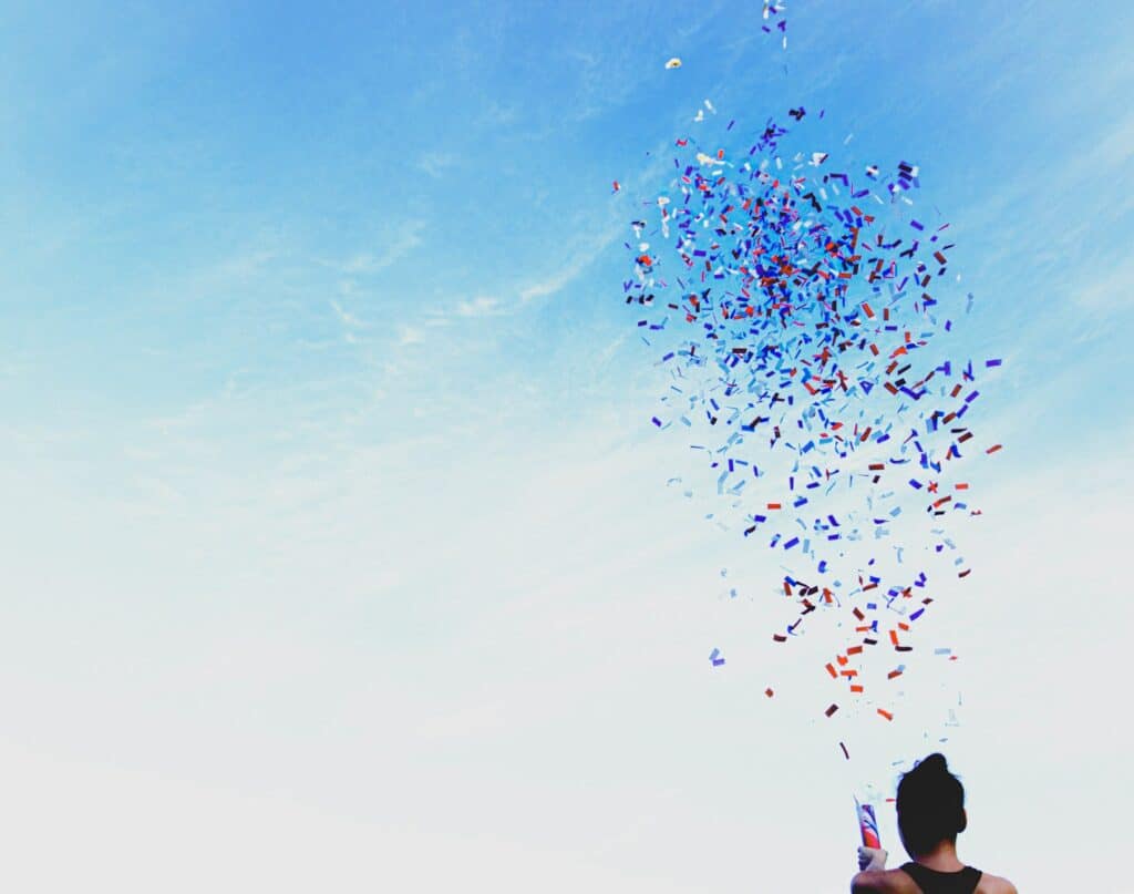woman wears black tank top