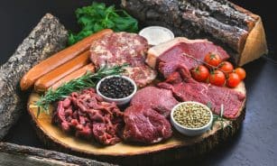 raw meat on white ceramic plate