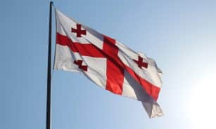 red and white flag on pole