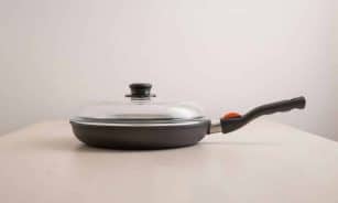 a pan with a lid on a table