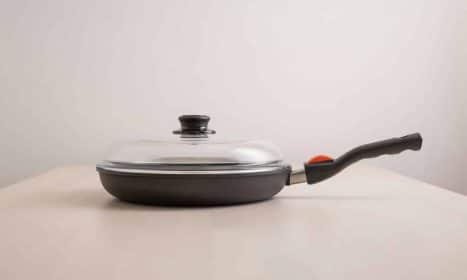 a pan with a lid on a table