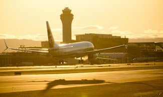 white passenger plane on airport during daytime