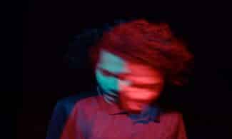 man in gray polo shirt