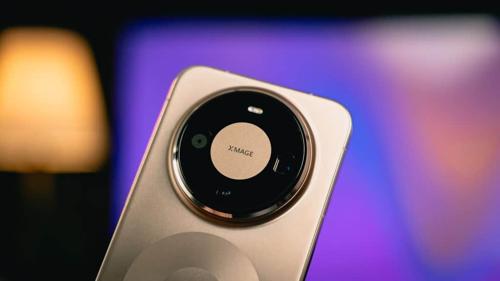 Close-up of a gold smartphone camera lens