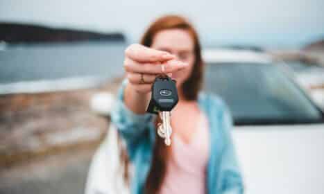 focus photography of black vehicle key