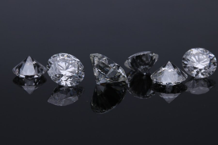 two diamond studded silver rings