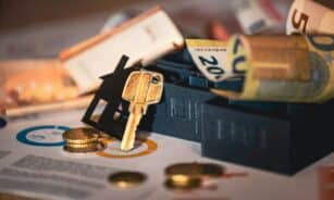 A pile of money sitting on top of a table