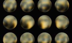 a set of nine shiny balls on a black background