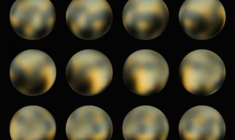 a set of nine shiny balls on a black background