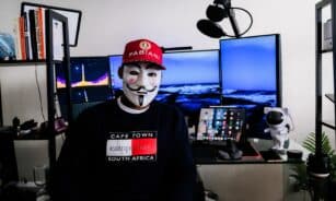 a person wearing a mask and a red hat