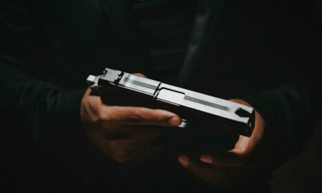 a person holding a gun in their hands