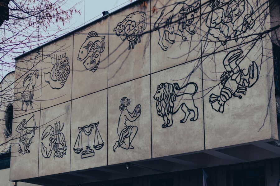 a building that has a bunch of drawings on it