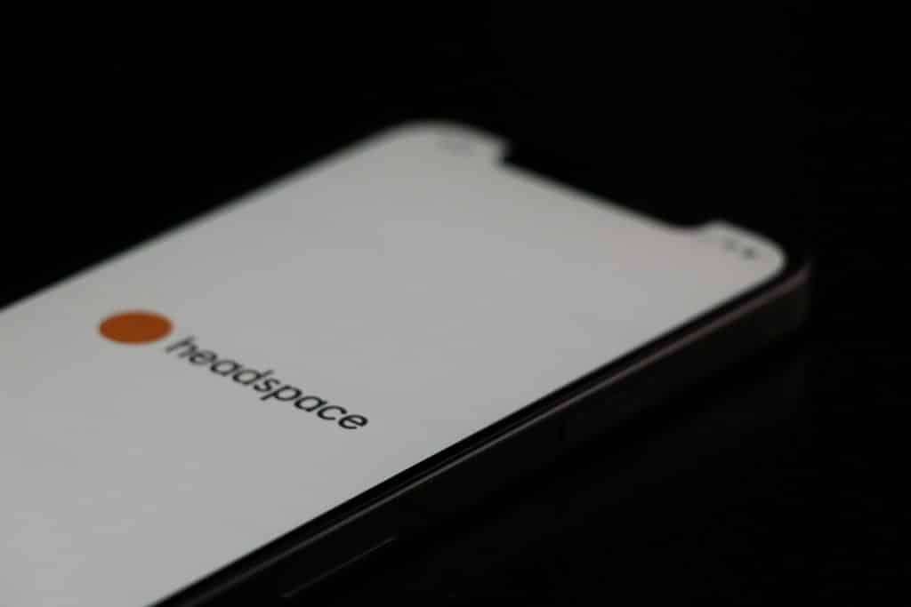 a close up of a cell phone on a table