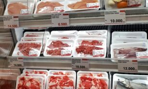 A display case filled with lots of different types of meat