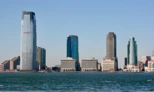 a city skyline with tall buildings