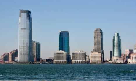 a city skyline with tall buildings