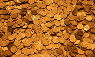 brown round coins on brown wooden surface