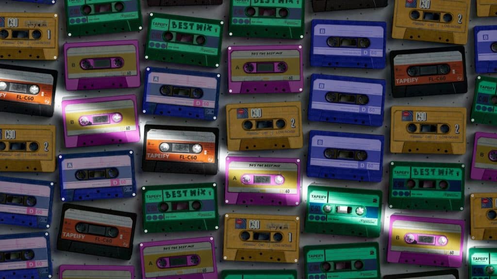 a wall of cassette tapes with the words best mix on them