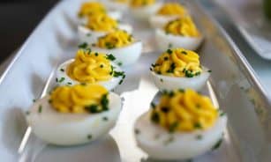 white and yellow icing covered cupcakes