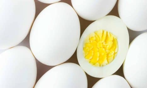 white egg lot on brown wooden table