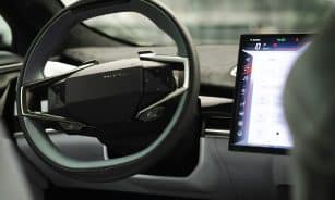a car dashboard with an electronic device in the center