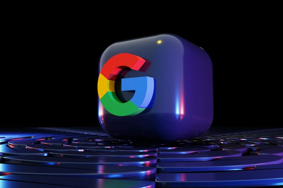 a google logo sitting on top of a computer keyboard