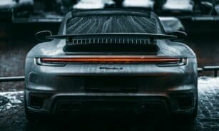 black car in grayscale photography