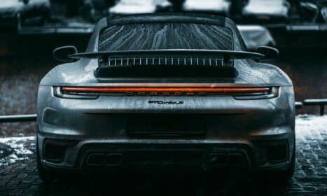 black car in grayscale photography