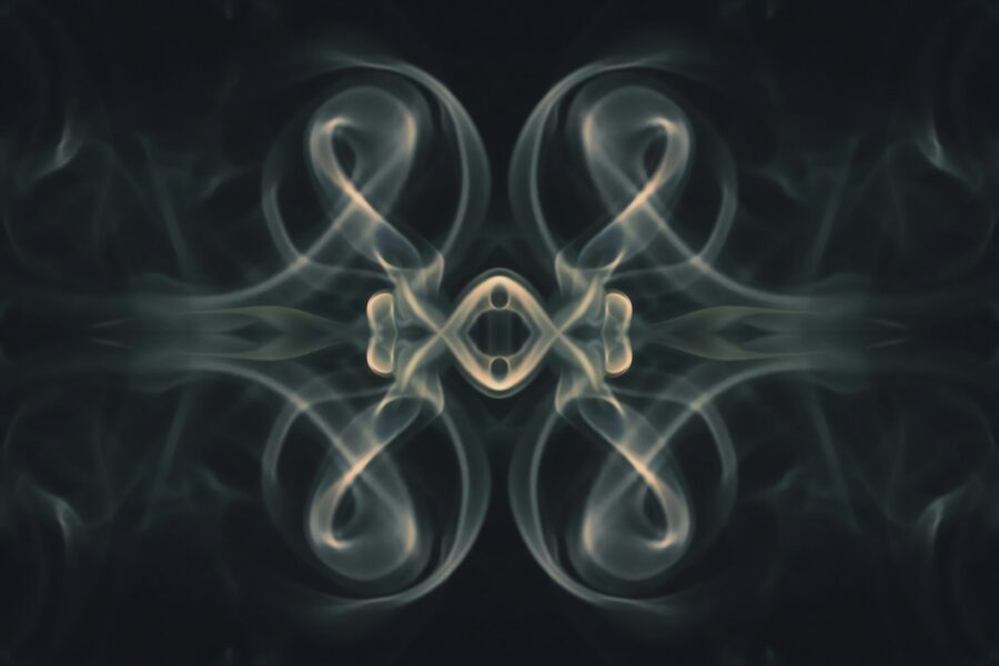 a picture of smoke with a black background