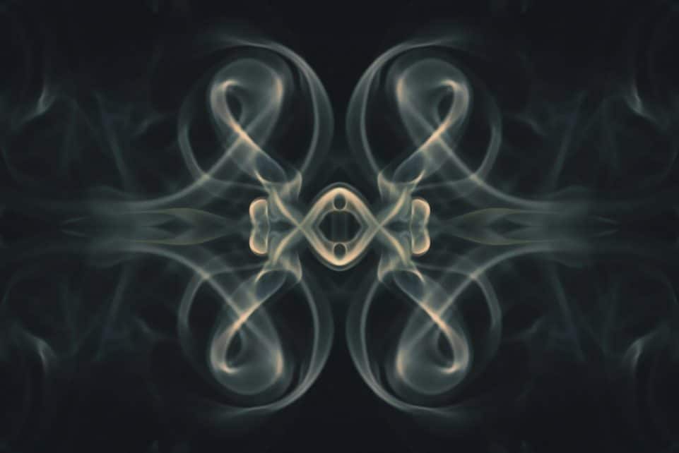 a picture of smoke with a black background