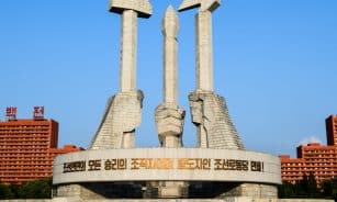 white concrete building under blue sky during daytime