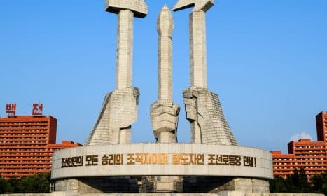 white concrete building under blue sky during daytime
