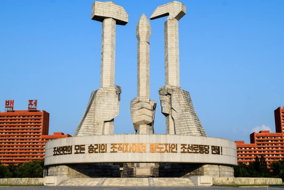 white concrete building under blue sky during daytime