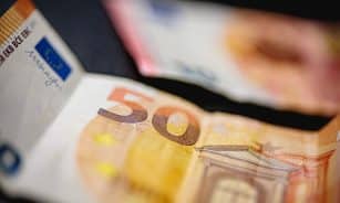 Pinigų iliustracija. ELTA / Josvydas Elinskas