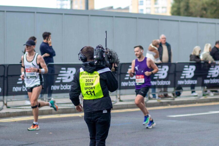 BBC captures London's iconic marathon as runners compete in the streets.
