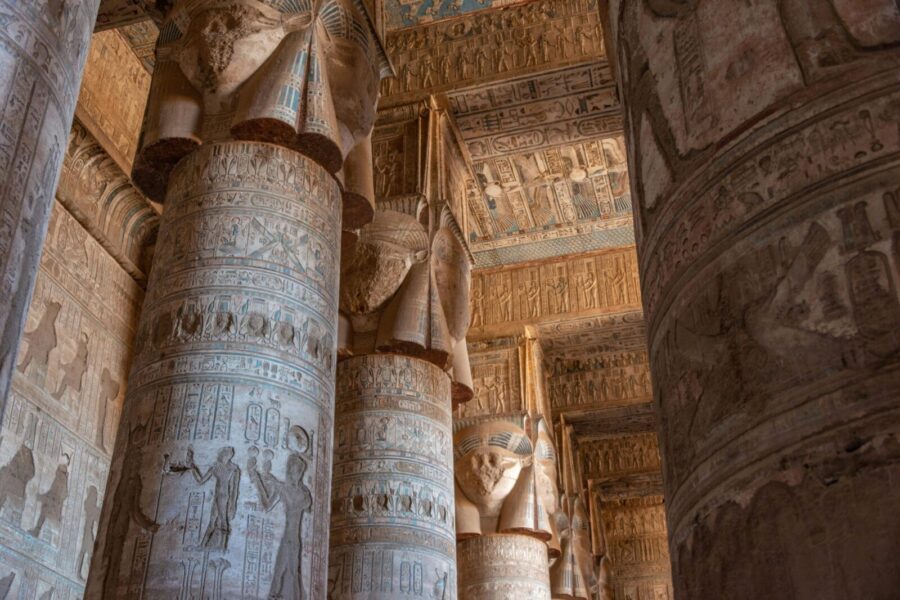 Explore the rich history of Dendera Temple adorned with detailed Egyptian hieroglyphs.