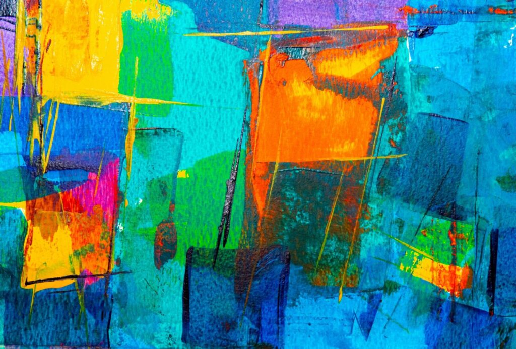 Dynamic abstract painting featuring vibrant and bold colors in an expressive style.