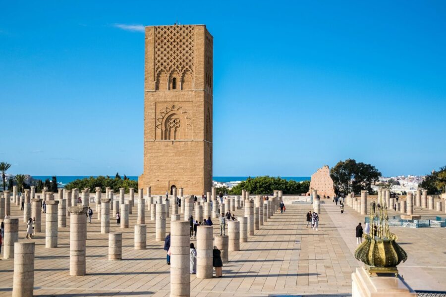 The iconic Hassan Tower amidst a sea of historical columns in Rabat, Morocco.