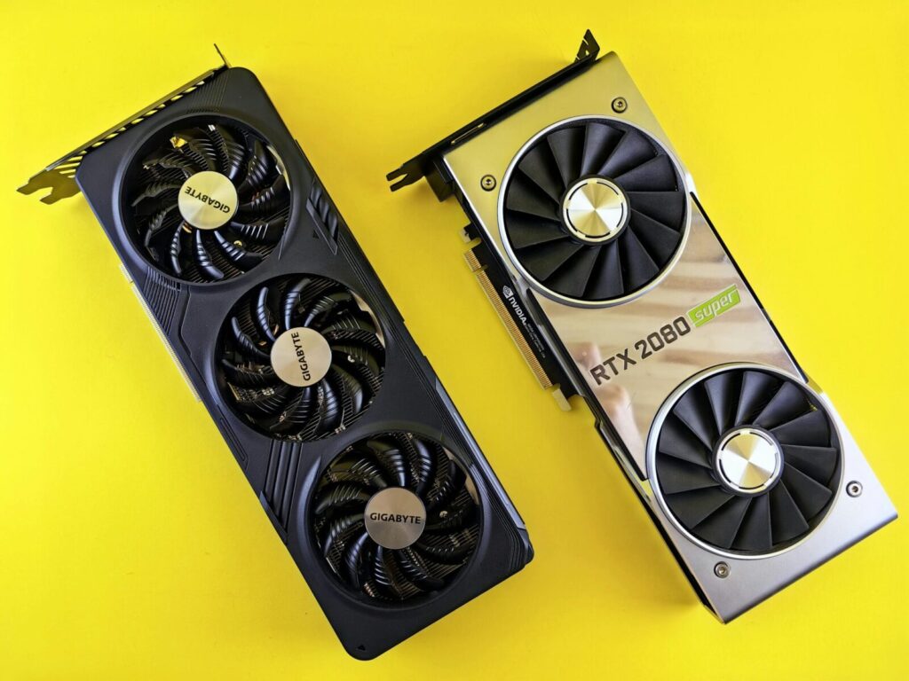 Two high-performance graphics cards displayed on a bright yellow background.