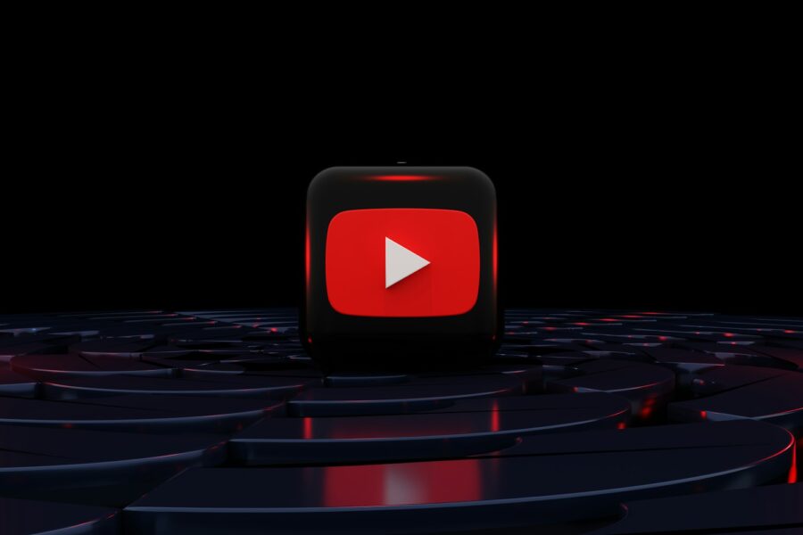 a red play button on a black background