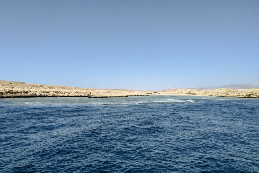 a body of water next to the ocean