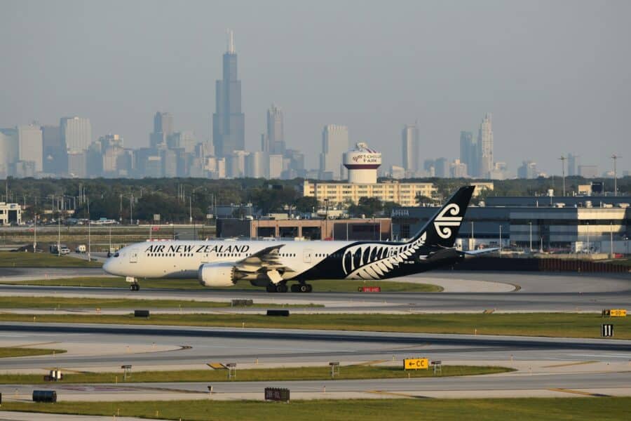 a large jetliner sitting on top of an airport runway