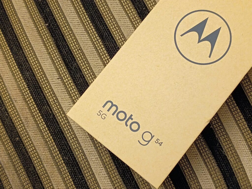 a close up of a motorola logo on a fabric