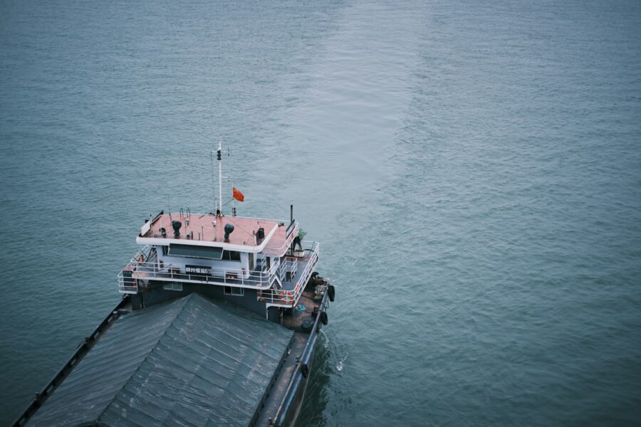 white and black ship on sea during daytime