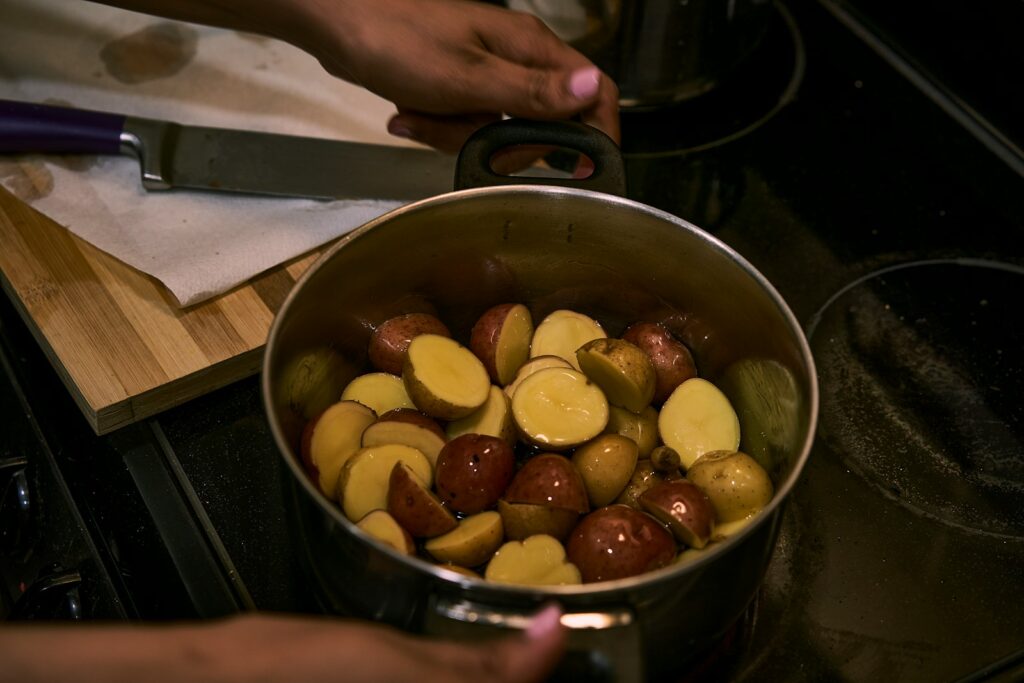 a person cooking food in a pot